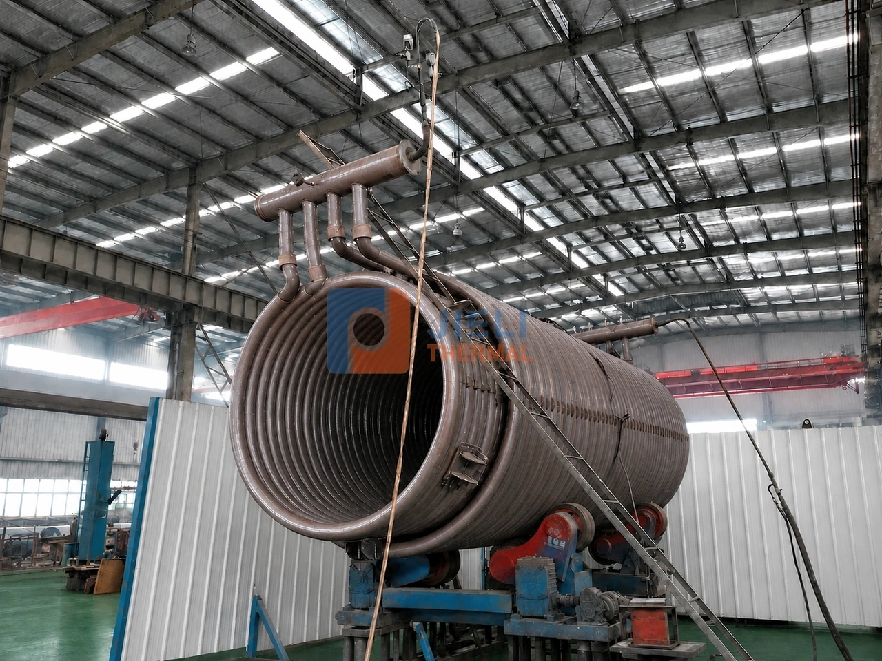 First-stage YL-500 gas thermal oil heater coil assembly in the production workshop First-stage YL-500 gas thermal oil heater coil assembly in the production workshop